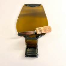 Load image into Gallery viewer, Amber/Brown Melted Wine Bottle Cheese Plate with Cork Cheese Spreader Knife
